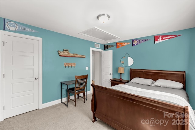 carpeted bedroom featuring visible vents and baseboards