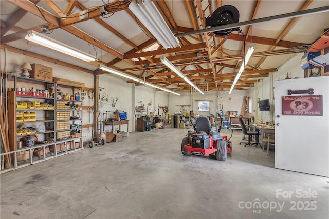 garage featuring a workshop area