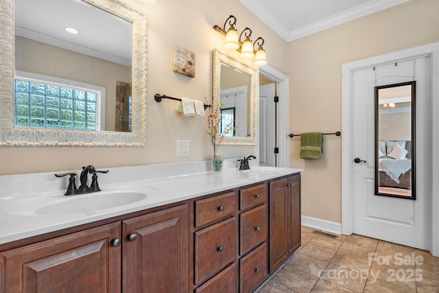 full bath featuring a sink, visible vents, double vanity, and crown molding