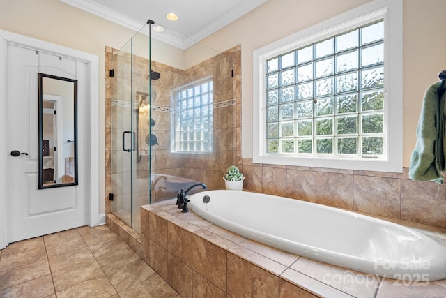 full bathroom with a shower stall, a garden tub, tile patterned floors, and ornamental molding