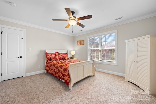 bedroom featuring visible vents, light carpet, a ceiling fan, crown molding, and baseboards