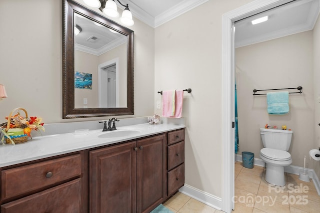 bathroom with tile patterned floors, toilet, crown molding, baseboards, and vanity