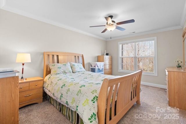 bedroom featuring ceiling fan, baseboards, light carpet, and ornamental molding