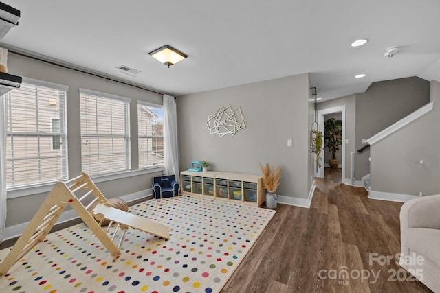 rec room with visible vents, recessed lighting, baseboards, and wood finished floors