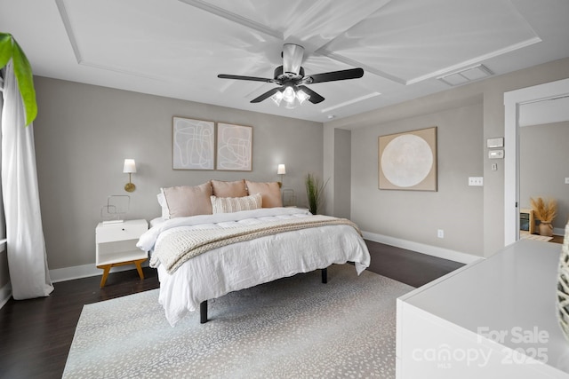 bedroom featuring visible vents, a ceiling fan, dark wood-type flooring, and baseboards