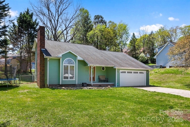 single story home featuring an attached garage, a trampoline, a chimney, concrete driveway, and a front lawn