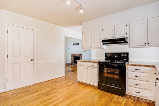 kitchen with light wood-type flooring, white cabinetry, electric range, crown molding, and under cabinet range hood