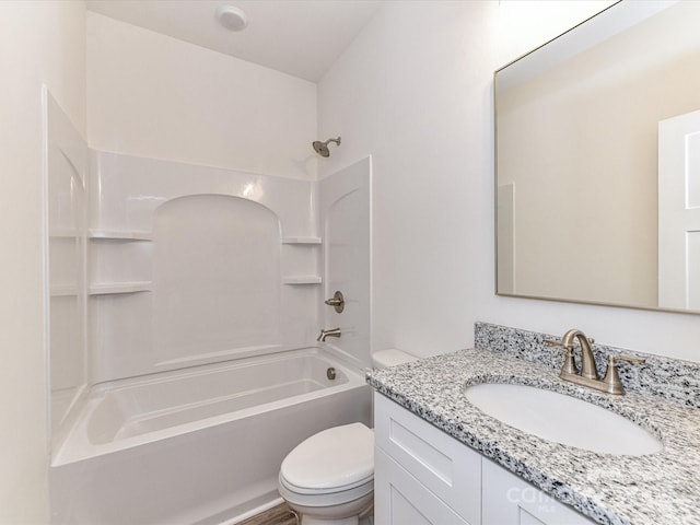 full bathroom with bathtub / shower combination, toilet, and vanity