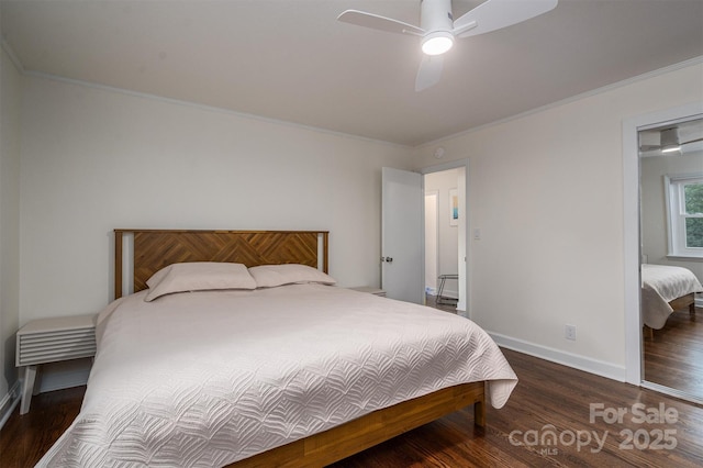 bedroom with baseboards, a ceiling fan, wood finished floors, and crown molding