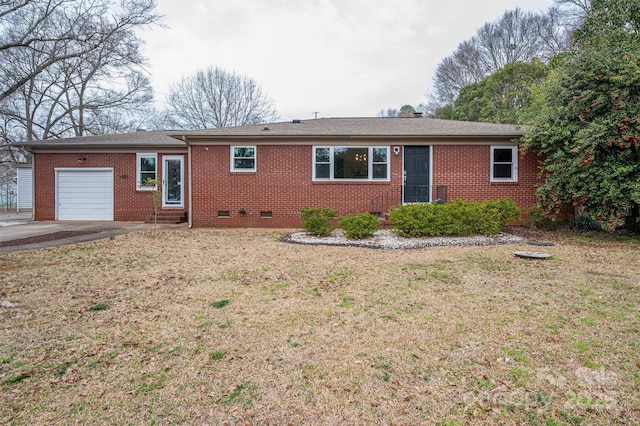 view of front of home with brick siding, entry steps, a front yard, crawl space, and an attached garage