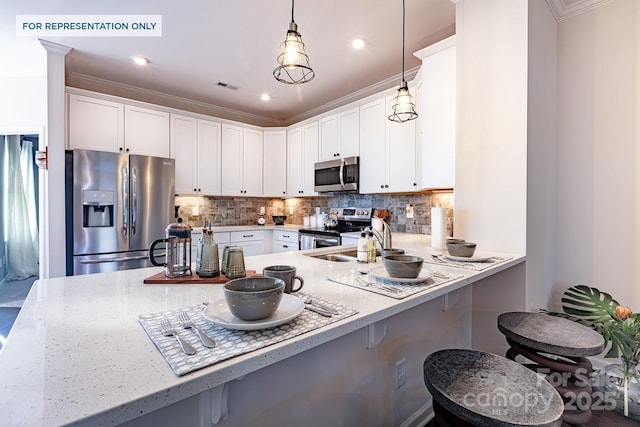 kitchen featuring visible vents, backsplash, ornamental molding, appliances with stainless steel finishes, and a sink