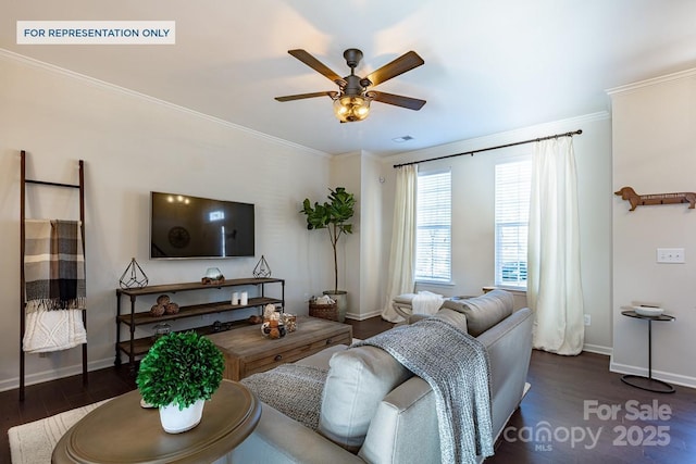 living room featuring dark wood-style floors, crown molding, and baseboards