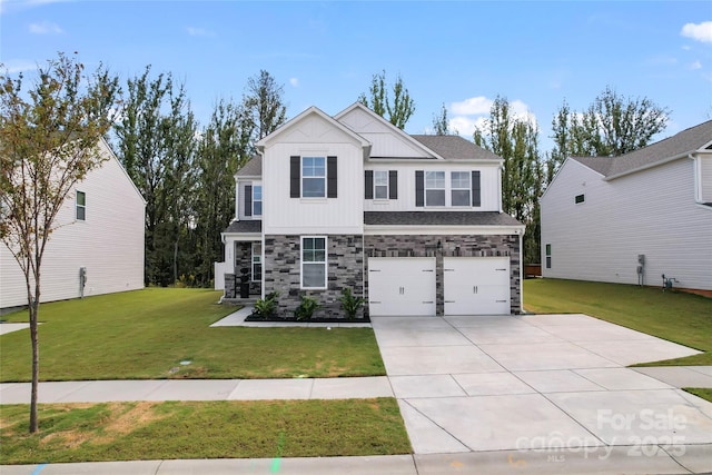 view of front of home with roof with shingles, an attached garage, a front lawn, concrete driveway, and board and batten siding