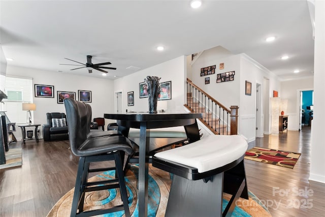 dining space featuring stairs, recessed lighting, wood finished floors, and ceiling fan