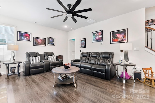 living area featuring ceiling fan, visible vents, wood finished floors, and recessed lighting