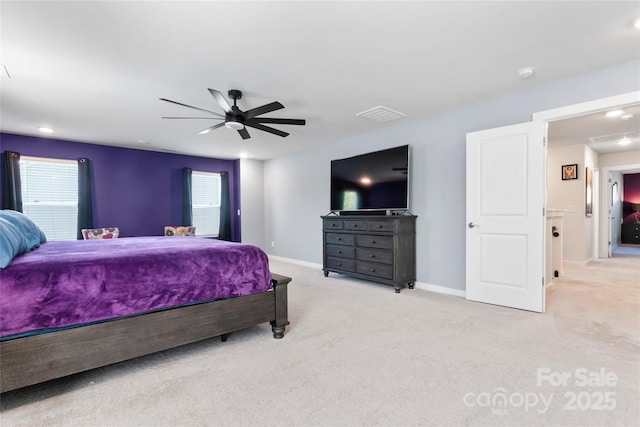 bedroom with ceiling fan, carpet, visible vents, and baseboards