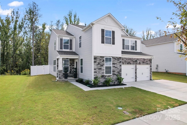 view of front of home featuring stone siding, fence, concrete driveway, a front yard, and a garage