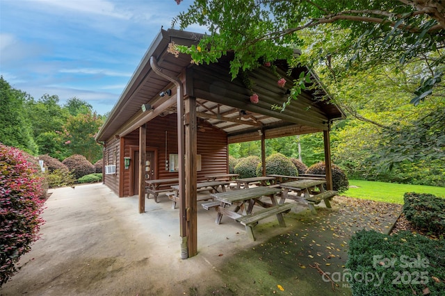 view of property's community featuring a patio area