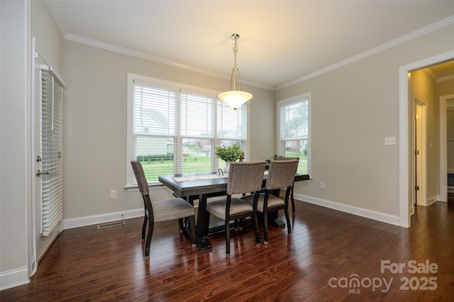 dining area with crown molding, dark wood-style floors, visible vents, and baseboards