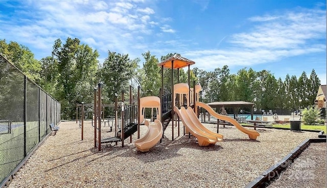 community play area featuring fence