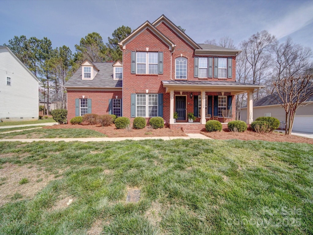 2538 Cherry Bark Oak Ct, Gastonia, NC 28056 - view of front of home with brick siding, a porch, and a front yard