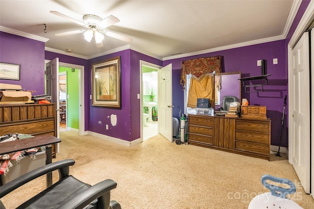 carpeted bedroom featuring visible vents, baseboards, ensuite bath, ceiling fan, and crown molding