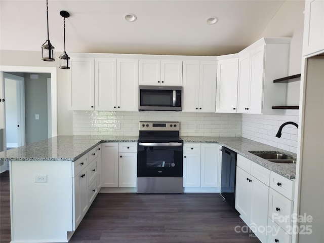 kitchen with open shelves, a sink, appliances with stainless steel finishes, a peninsula, and white cabinets