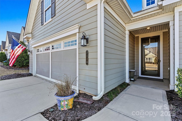 property entrance featuring driveway