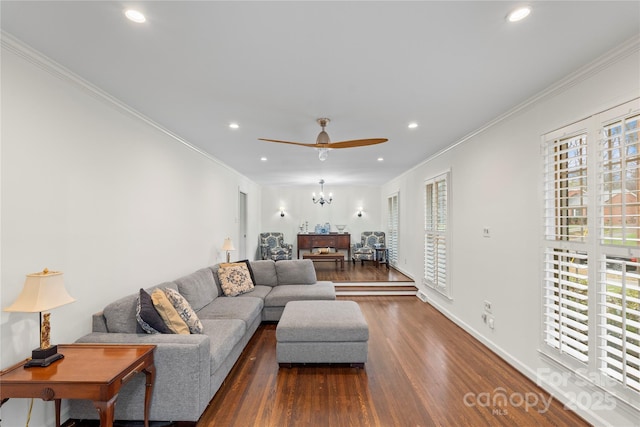 living area featuring recessed lighting, dark wood finished floors, and ornamental molding