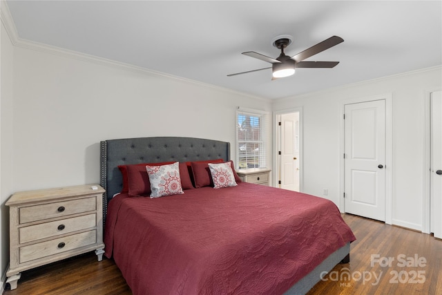 bedroom featuring dark wood-type flooring, ceiling fan, and ornamental molding