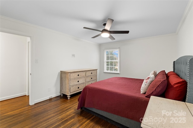 bedroom with ornamental molding, a ceiling fan, baseboards, and wood finished floors