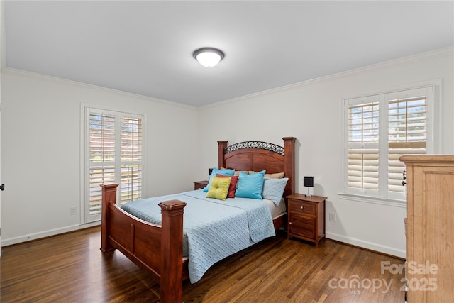 bedroom featuring baseboards, wood finished floors, and crown molding