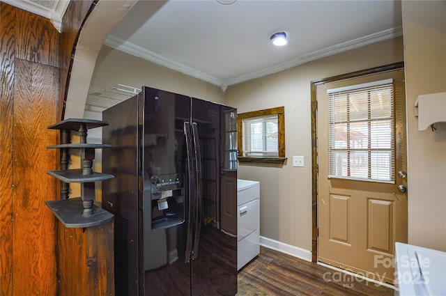 laundry area featuring ornamental molding, washer / clothes dryer, laundry area, baseboards, and dark wood-style flooring