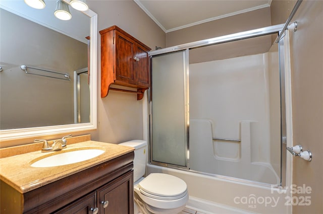 bathroom featuring combined bath / shower with glass door, vanity, toilet, and crown molding