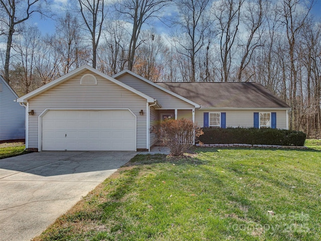 single story home with a garage, a front yard, and driveway