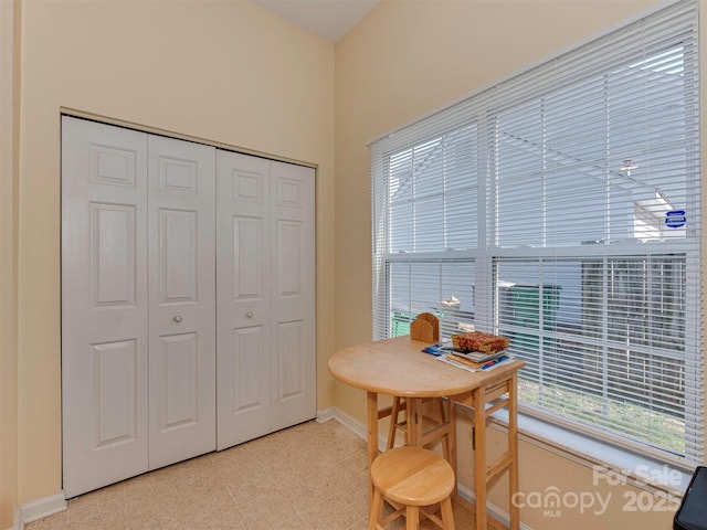 dining room with baseboards