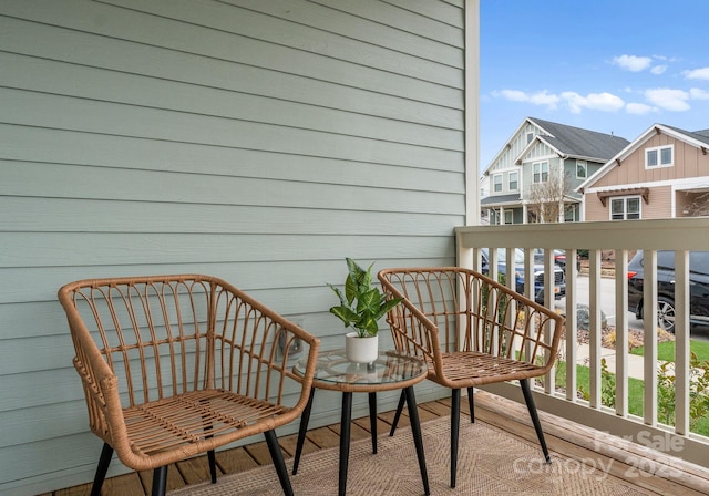 balcony featuring a residential view