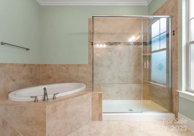 full bathroom featuring a bath, tile patterned flooring, a stall shower, and ornamental molding