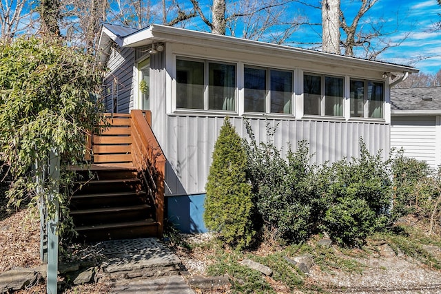 view of home's exterior with board and batten siding