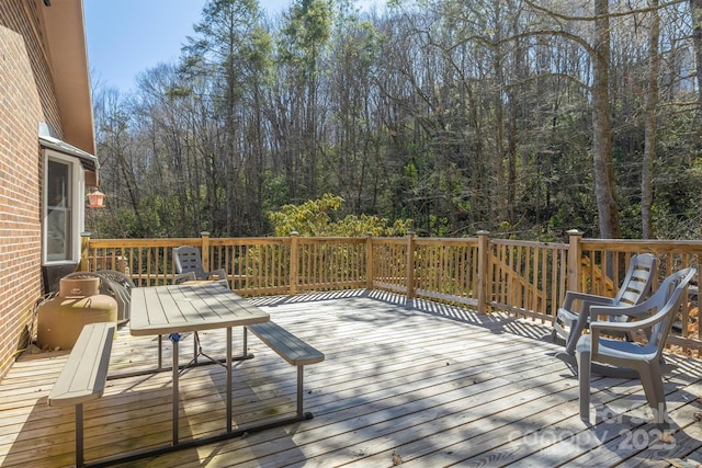 deck with a view of trees