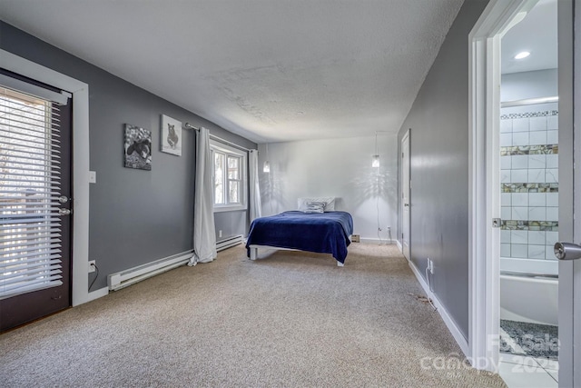 bedroom with carpet, baseboards, baseboard heating, and a textured ceiling