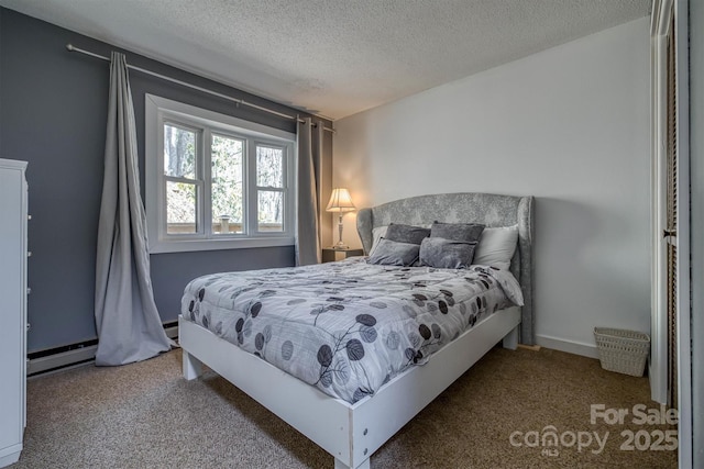 bedroom featuring baseboards, a textured ceiling, carpet, and a baseboard radiator