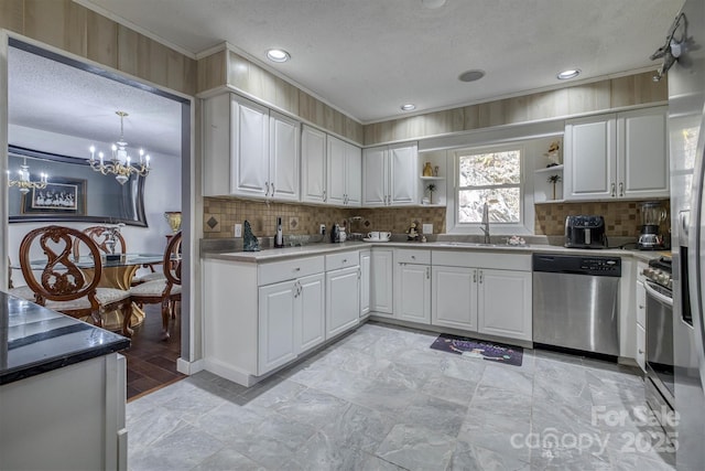 kitchen with backsplash, white cabinets, open shelves, and stainless steel dishwasher