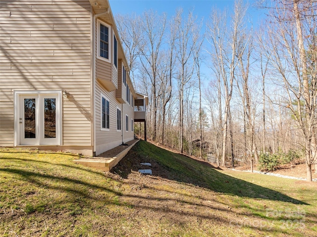 view of home's exterior featuring a yard