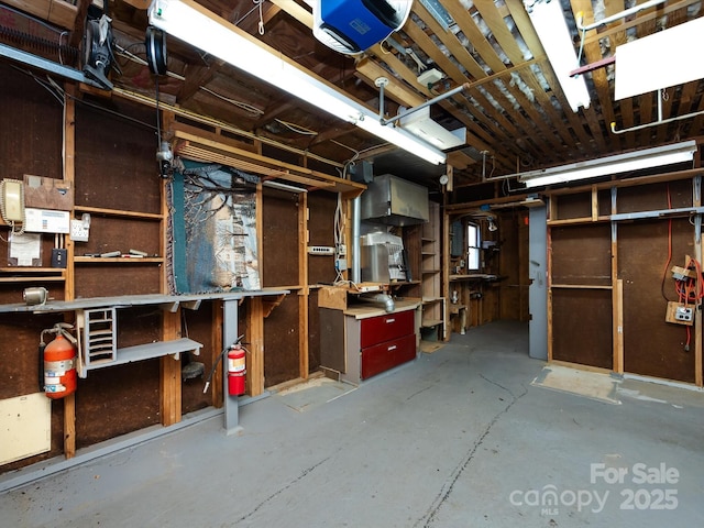 basement with a workshop area