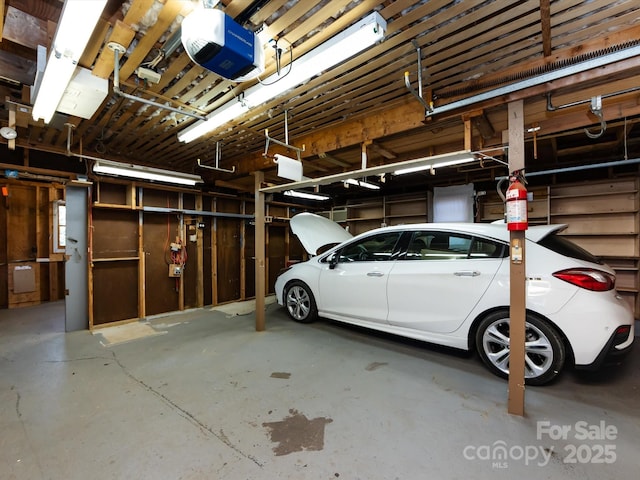 garage featuring a garage door opener