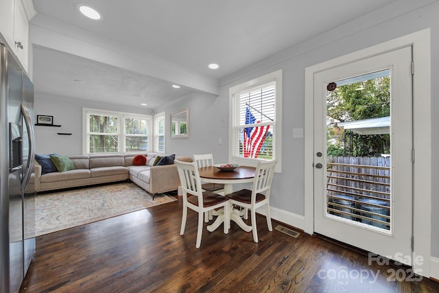 dining space with recessed lighting, dark wood-style floors, and a wealth of natural light