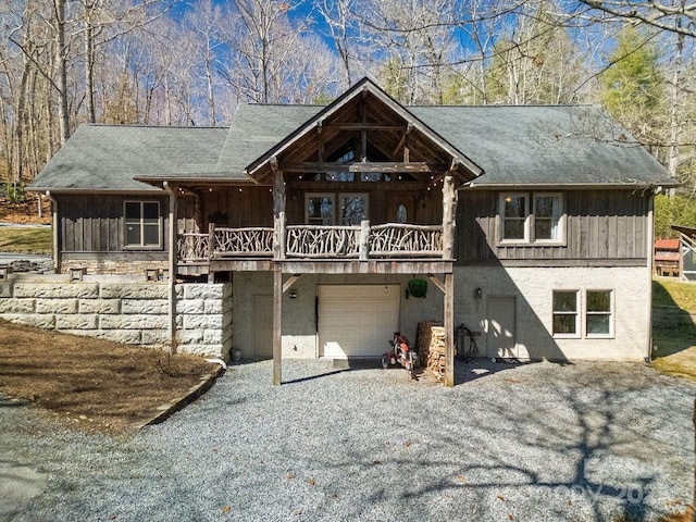 view of front of home with driveway and an attached garage