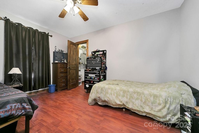 bedroom featuring ceiling fan and wood finished floors