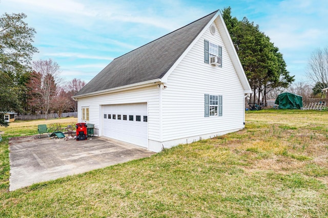 garage featuring driveway